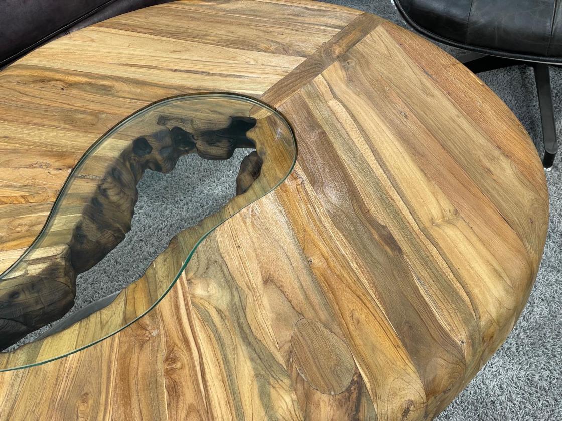Round Bonsai coffee table with wood top and glass detail.