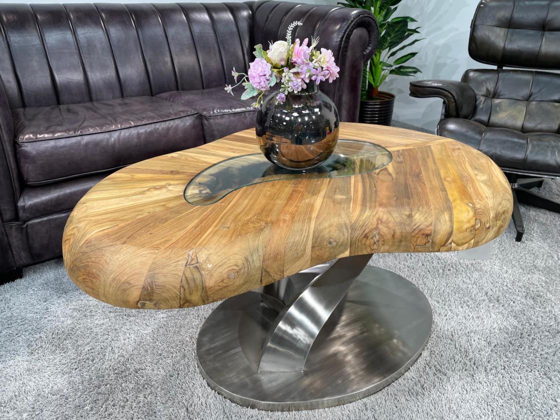 Living room table 'Bonsai' with stainless steel base and wood top.
