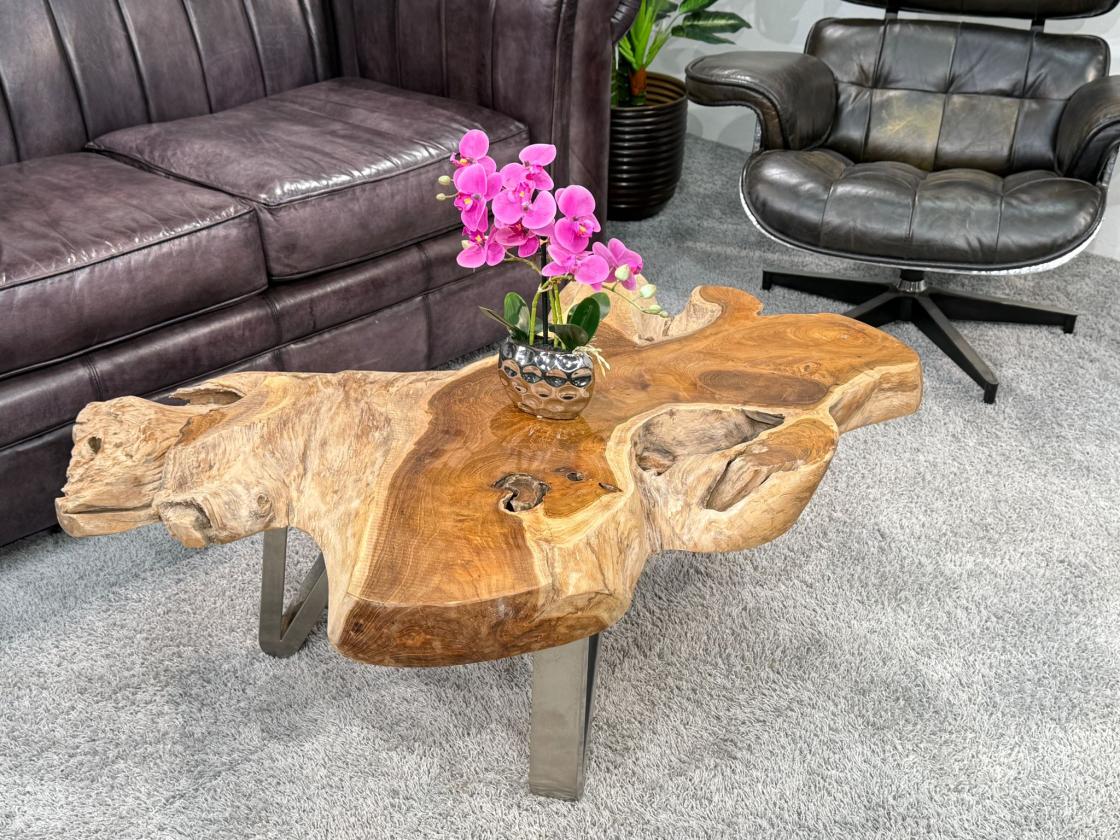 Couchtisch aus Teakholz mit Glasplatte, ca. 110x55-65x42 cm.