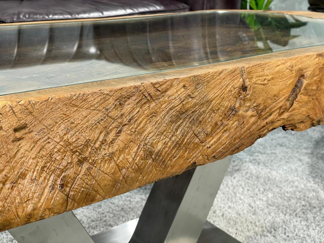 Coffee table from antique rice mortar with glass top, metal legs