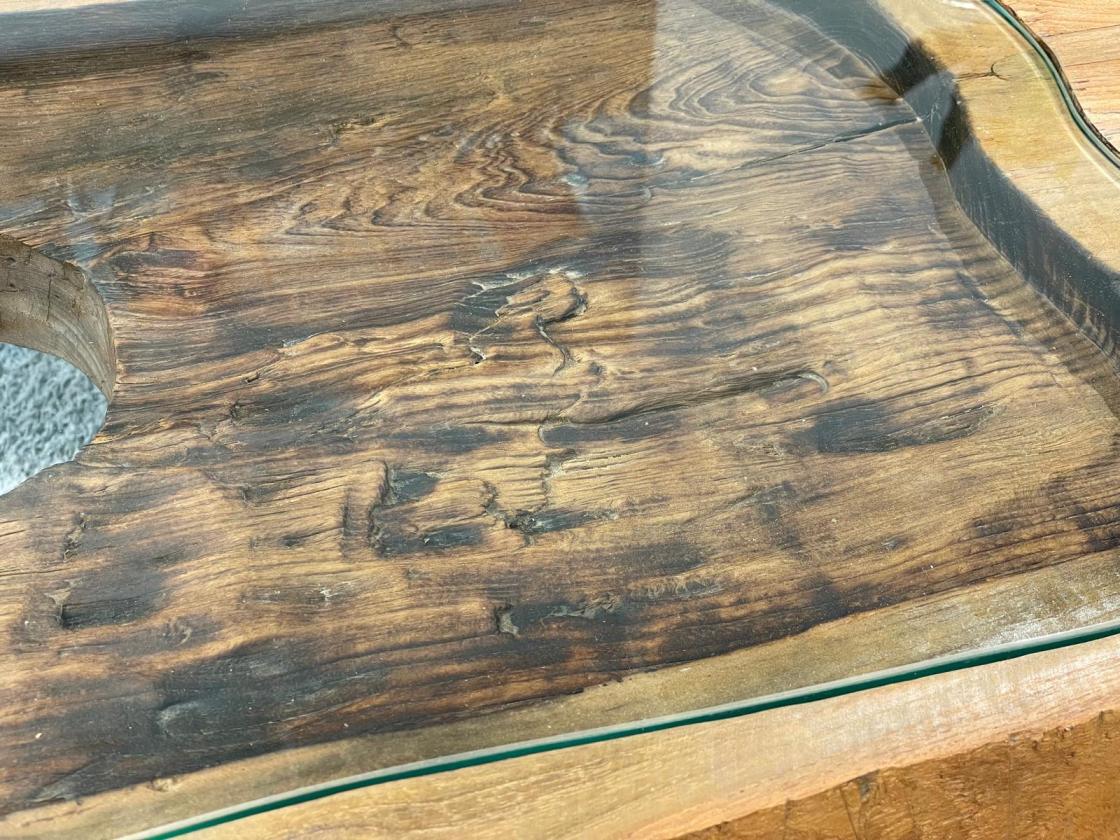 Coffee table from antique rice mortar with glass top, 109x52x51 cm