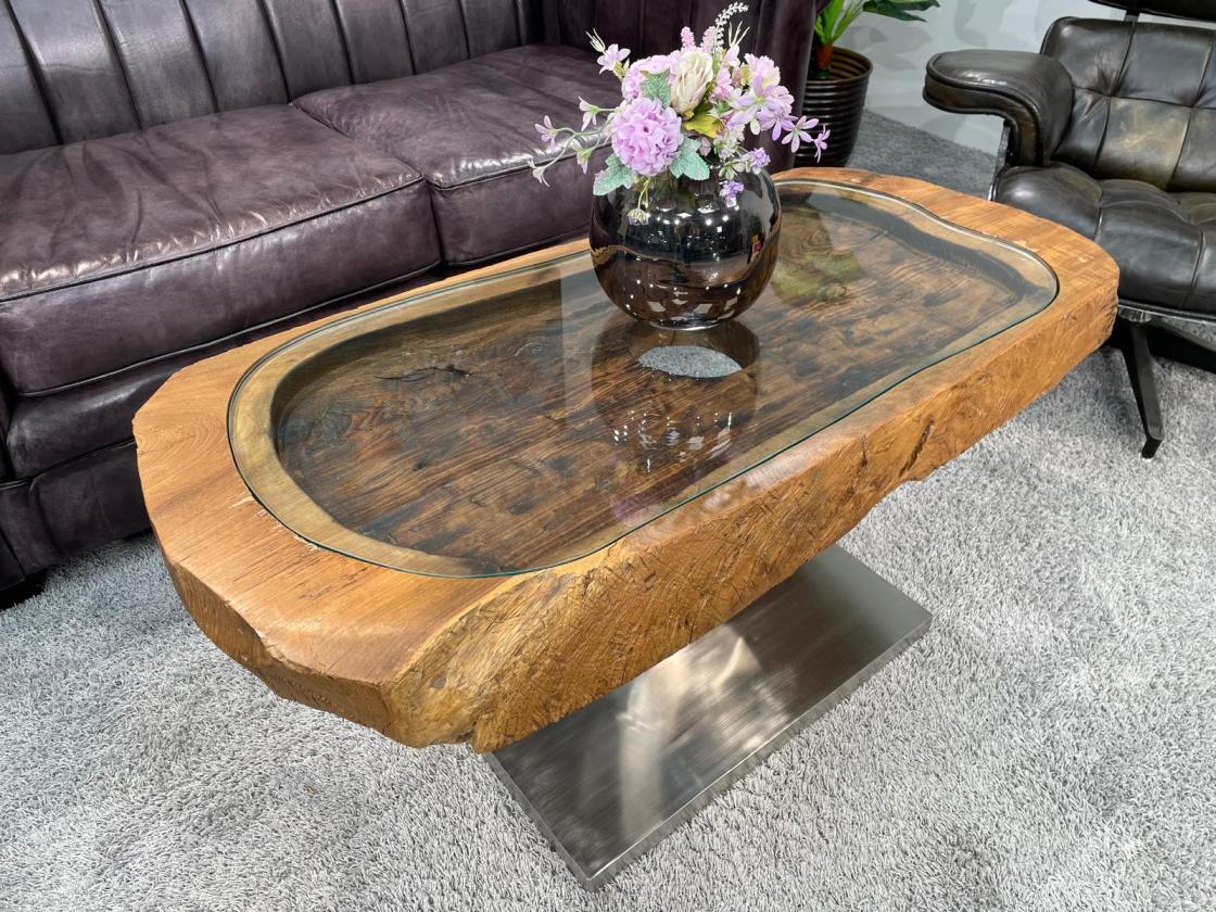 Rectangular coffee table from antique rice mortar with glass top.
