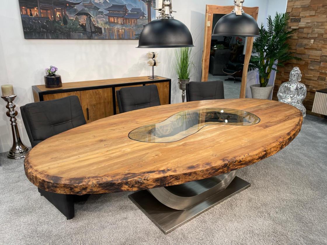 Ovaler Designtisch aus Massivholz und vollmassiver Tischplatte