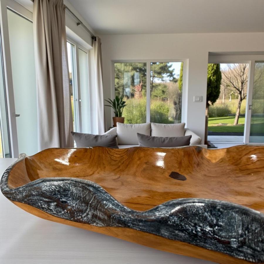 Holzschale Amalia aus Teakholz mit schwarz/silbernem Rand