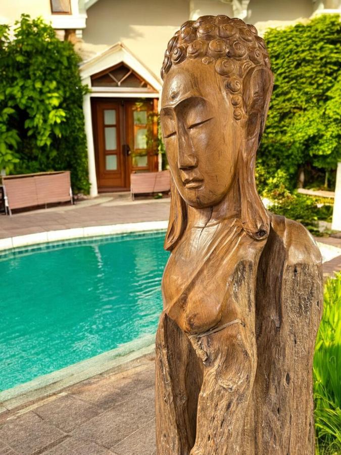 Holzskulptur Raumtrenner Teakholz