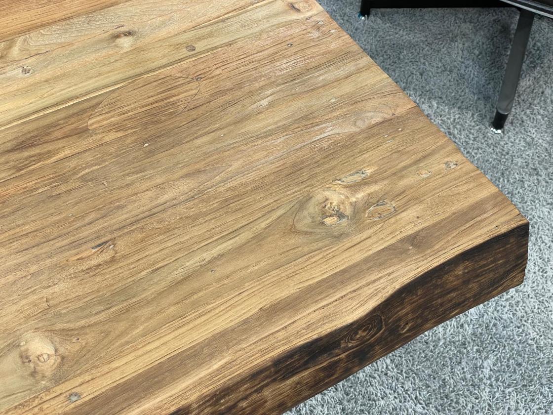 Solid wood coffee table from recycled teak with metal base.