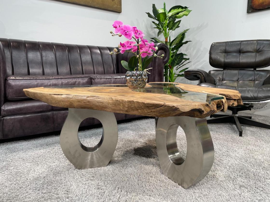 Coffee table with glass inlays and O-shaped steel legs