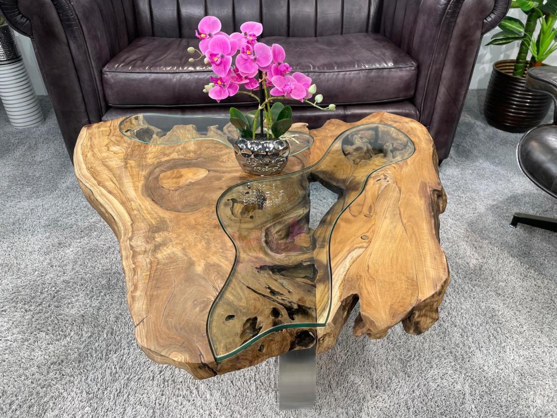 Coffee table with glass inlays and O-shaped steel legs