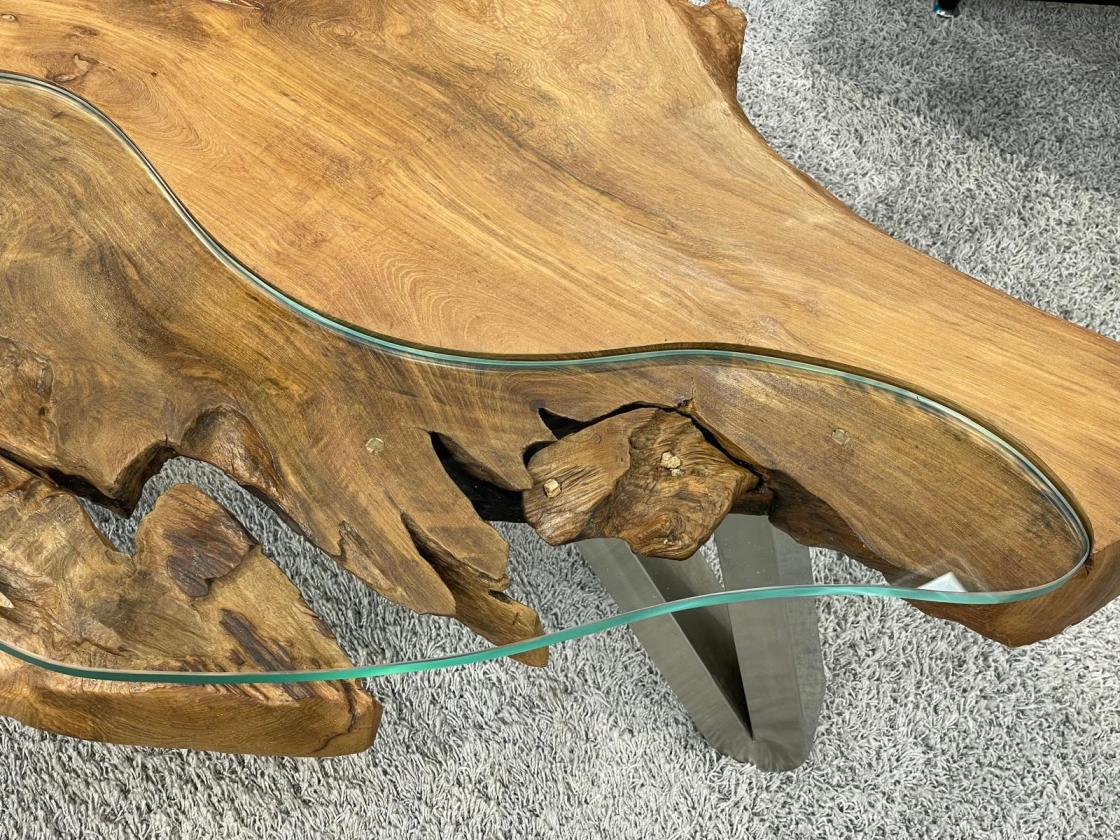 Tree trunk coffee table with glass top, irregular shape