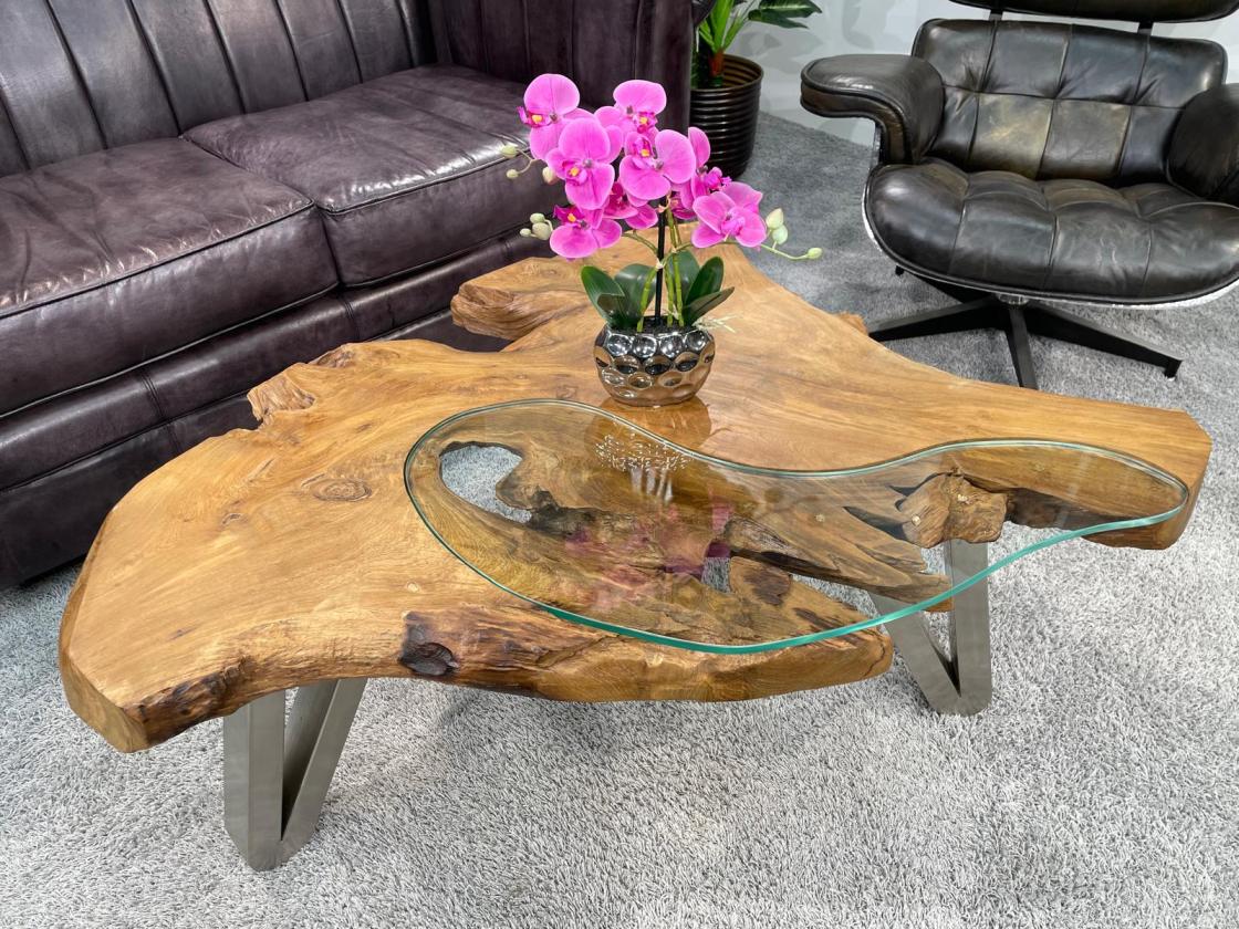 Tree trunk coffee table with glass top, approx. 103 x 85 x 44.5 cm.