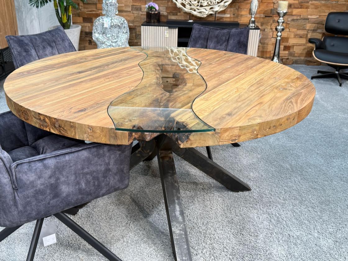 Round dining table 'Eternia' made of recycled wood with glass and steel frame.