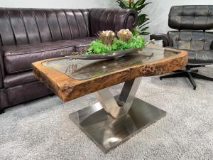 Antique coffee table from rice mortar, wooden top, metal base.