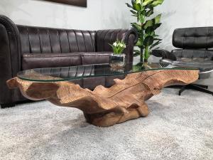 Sonderangebot Couchtisch "Leaf Litschi" ca. 142x40-50x40 cm aus einem Baumstumpf in Handarbeit geschnitzt mit Glasplatte