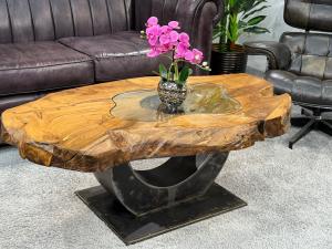 Einmaliger Couchtisch aus Teak Baumscheiben und Glas