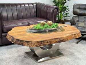Extravaganter Couchtisch "Fusion" aus Teakholz mit Glaseinlage, ca. 130 x 90 x 50 cm